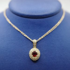 Ruby (0.81 ct) Pendant with Diamonds (0.49 ctw) Set in 18kt Yellow Gold