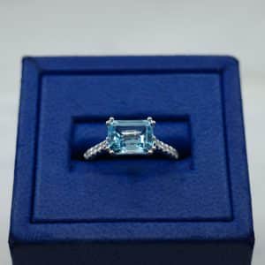 Blue Topaz (2.73 ctw) Emerald Cut in 14kt White Gold Ring with Diamonds (0.14 ctw)