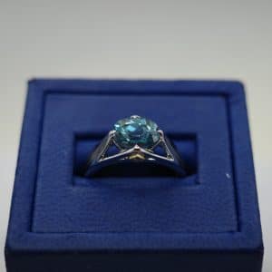 Blue Zircon (2.53) and Diamond (0.05 ctw) Set in 18kt Yellow and White Gold Ring