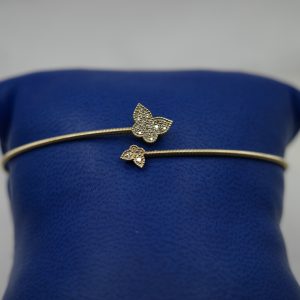 14kt yellow gold and diamond (0.10 ctw) butterfly bangle.